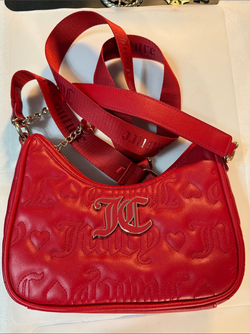 Juicy couture Red Quilted Logo Shoulder Bag Guc 7 x 9 x 3” appx